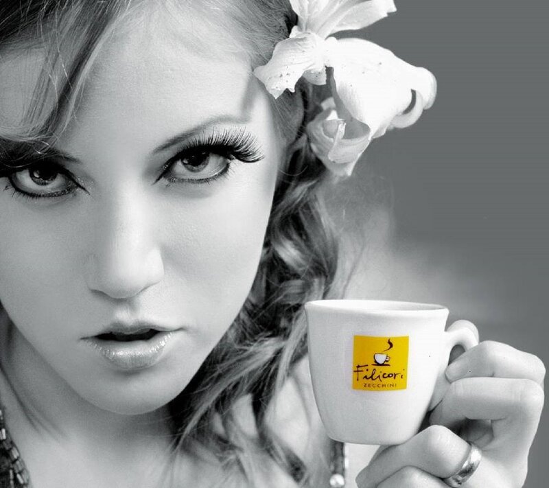 Woman Holding Coffee Cup — Black, Dramatic