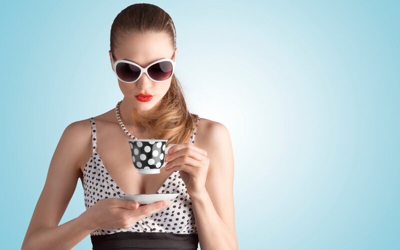 Woman Holding Coffee Cup — Blue, Calm