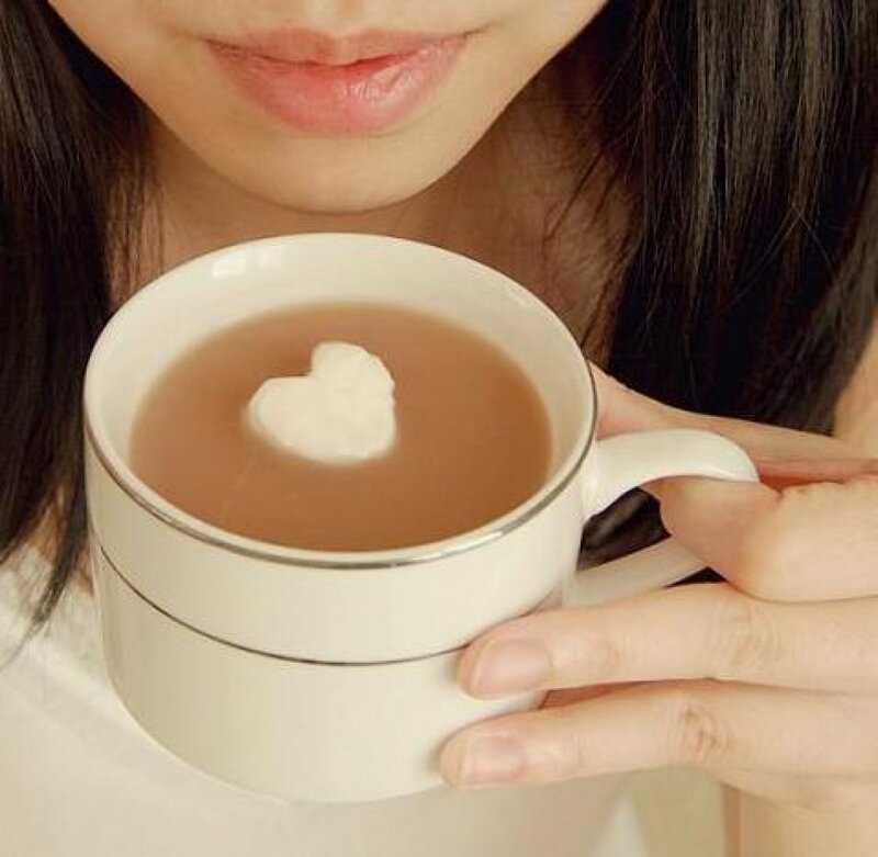 Woman Holding Coffee Cup — Brown, Calm