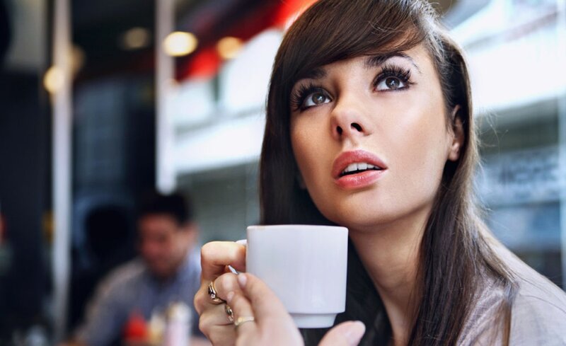 Woman Holding Coffee Cup — Brown, Contemplative