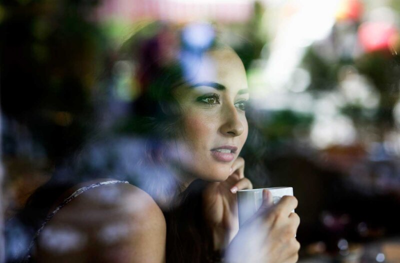 Woman Holding Coffee Cup — Brown