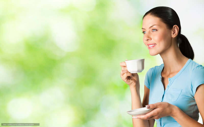 Woman Holding Coffee Cup — Green, Serene