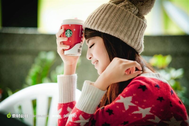 Woman Holding Coffee Cup — Red, Calm
