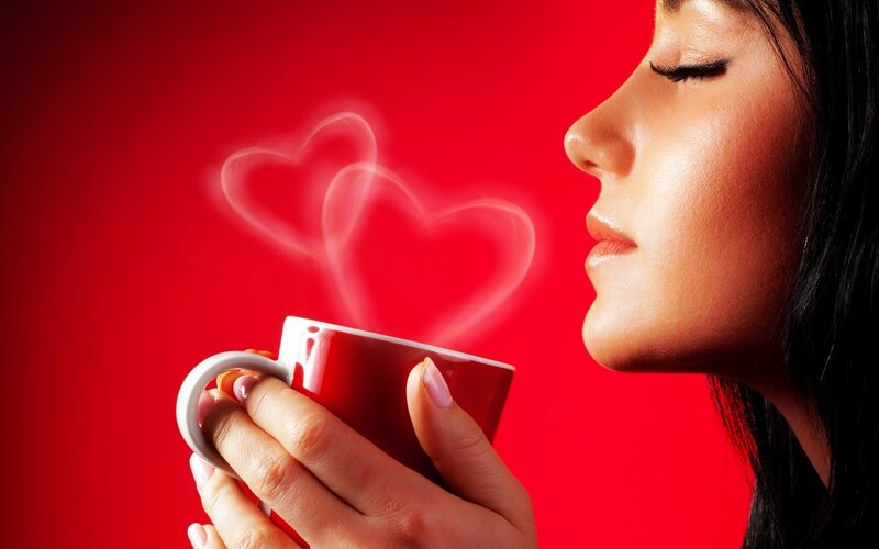 Woman Holding Coffee Cup — Red, Serene