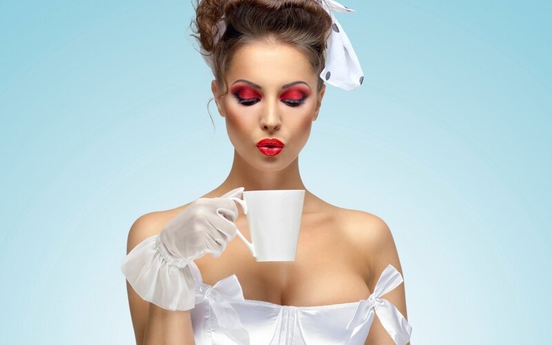 Woman Holding Coffee Cup — White, Dramatic