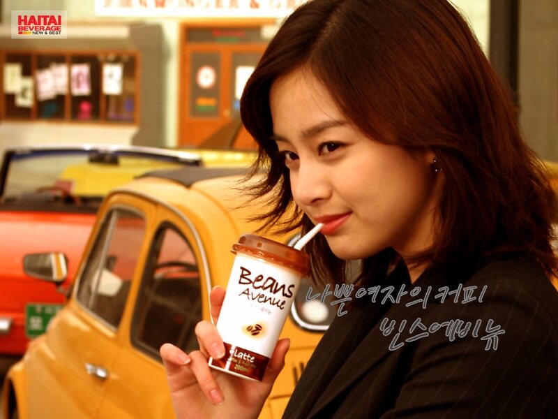 woman holding coffee drink