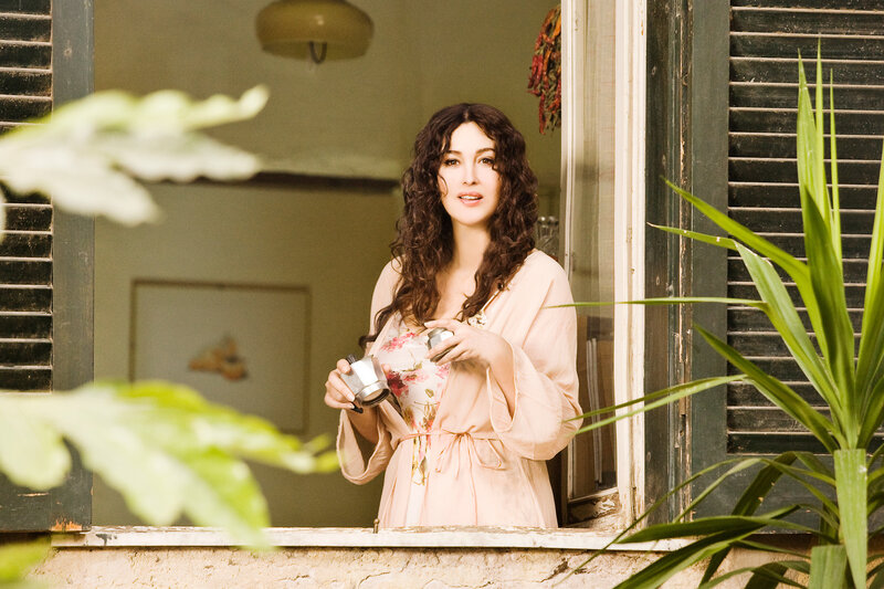 Woman Holding Coffee Pot