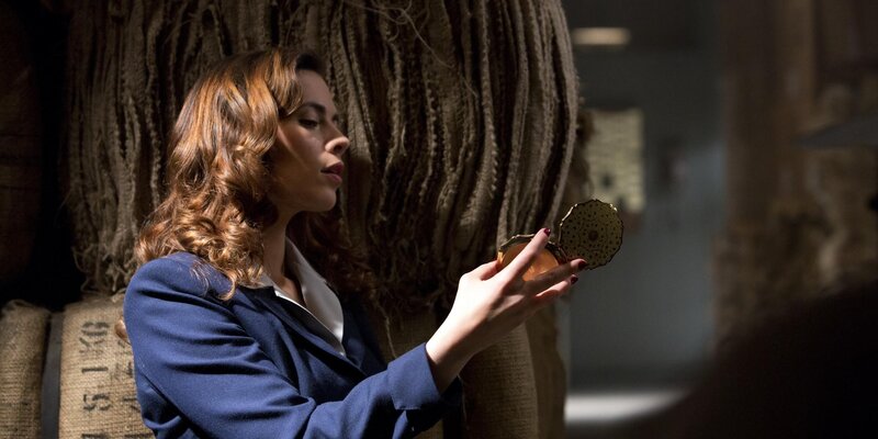 Woman Holding Compact Mirror — Blue