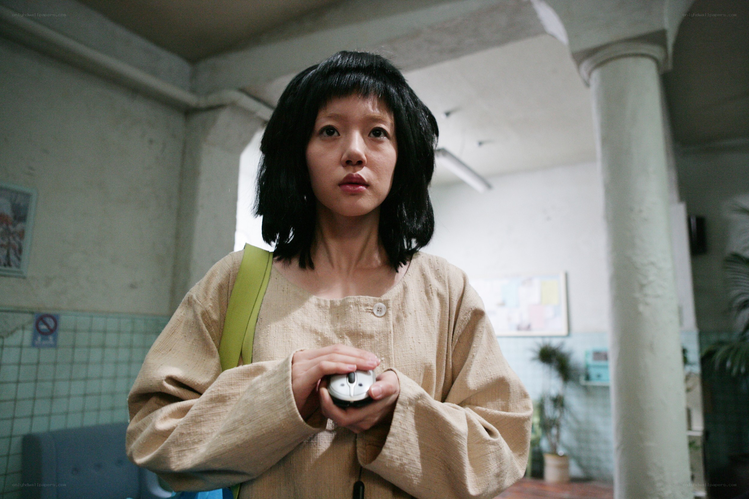 woman holding computer mouse