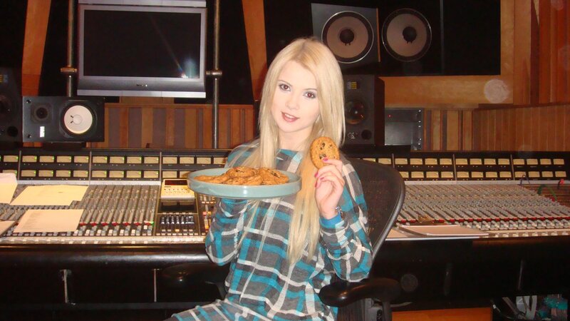 Woman Holding Cookies — Blue