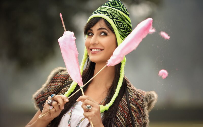 Woman Holding Cotton Candy — Pink, Playful, Photograph