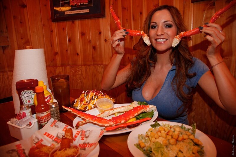 Woman Holding Crab Legs