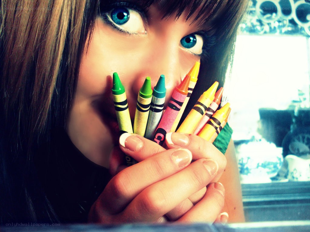 woman holding crayons