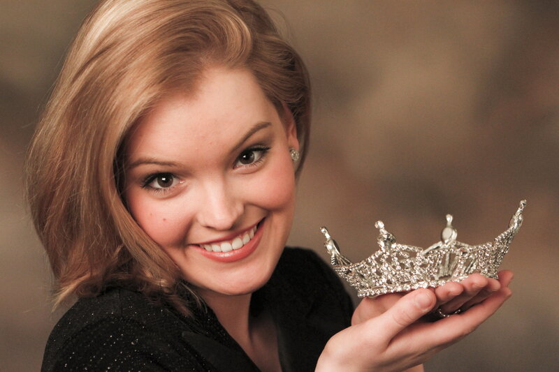 Woman Holding Crown
