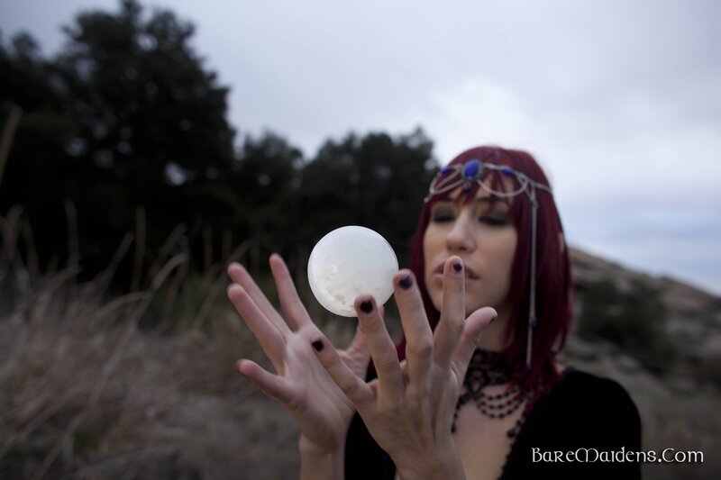 woman holding crystal ball