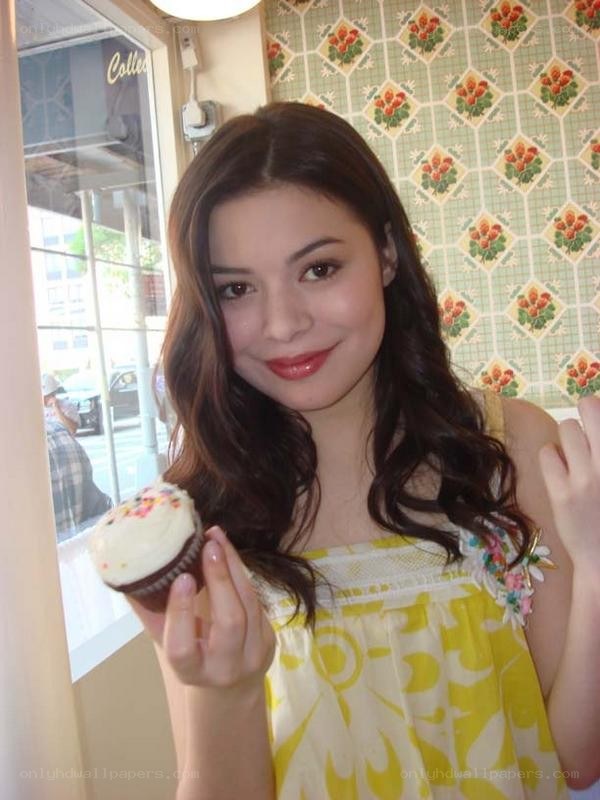 woman holding cupcake