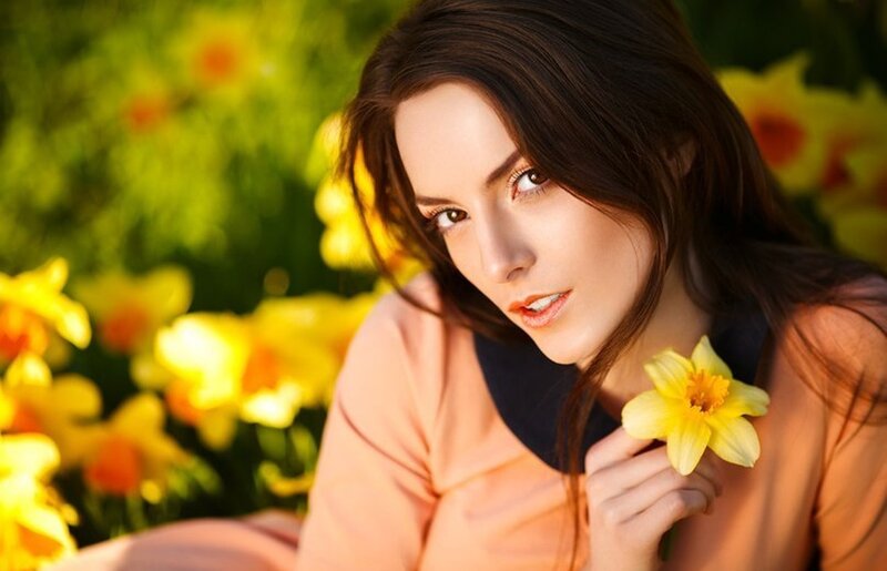 Woman Holding Daffodil