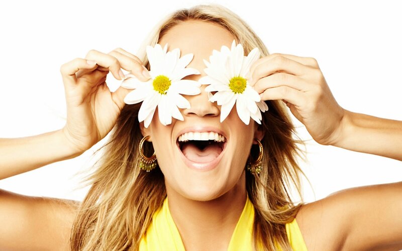 Woman Holding Daisies — White, Playful