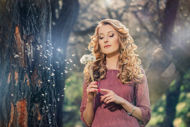 Woman Holding Dandelion — Pink