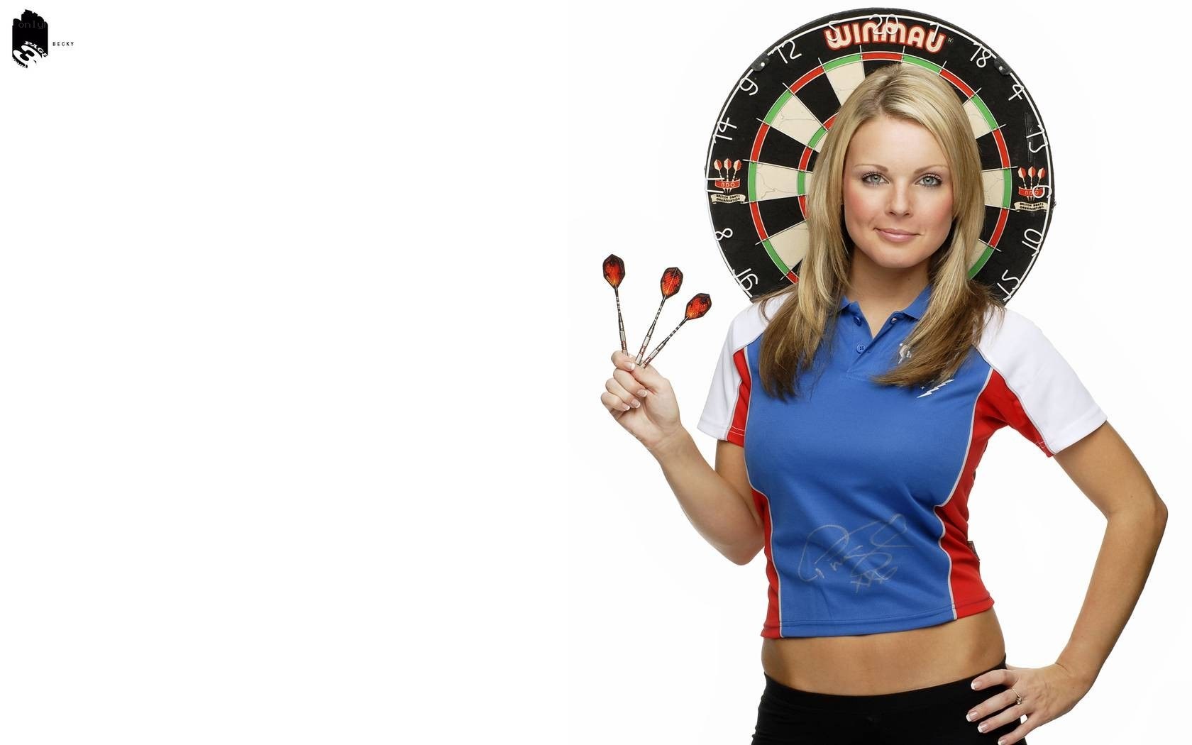 woman holding darts