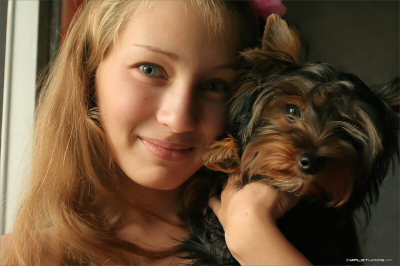 Woman Holding Dog — Brown, Calm, Photograph