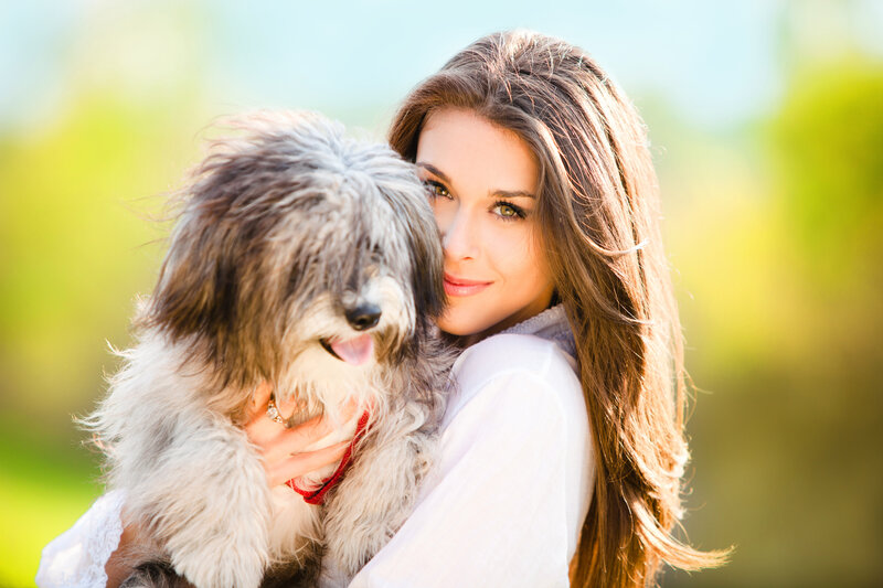 Woman Holding Dog — White, Serene