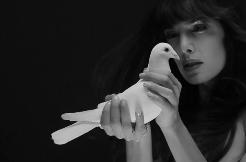 Woman Holding Dove — Black