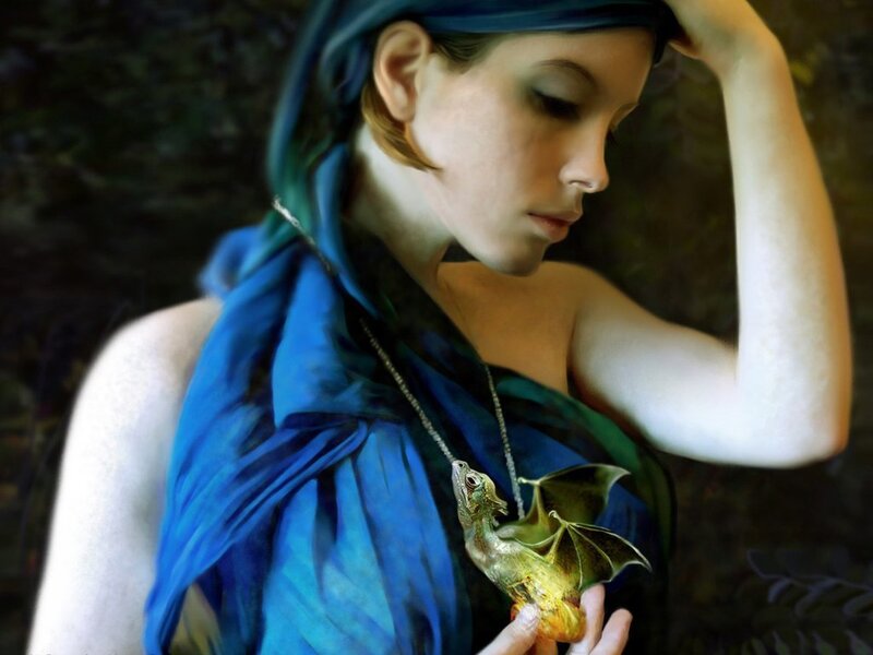 Woman Holding Dragon Pendant