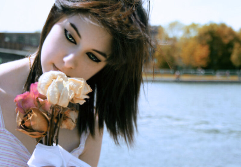 Woman Holding Dried Roses