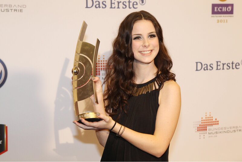 woman holding echo award
