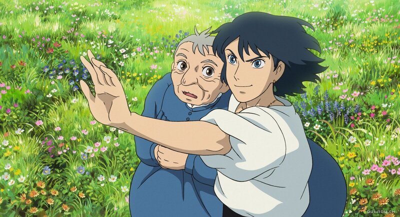 woman holding elderly man in field