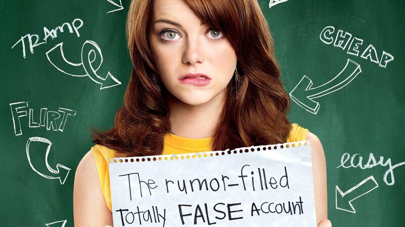 woman holding false account sign