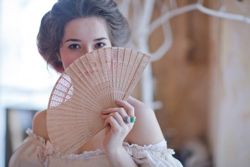 Woman Holding Fan — Beige, Playful