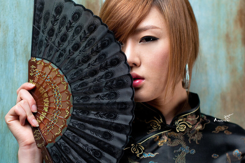 Woman Holding Fan — Black