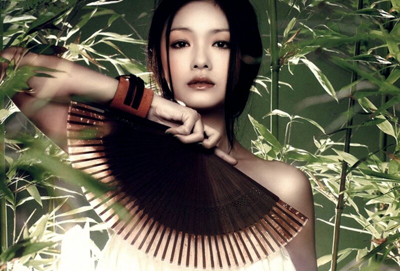 Woman Holding Fan — Green, Serene