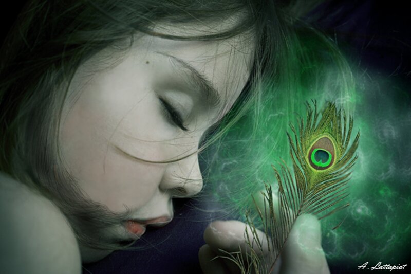 Woman Holding Feather — Green