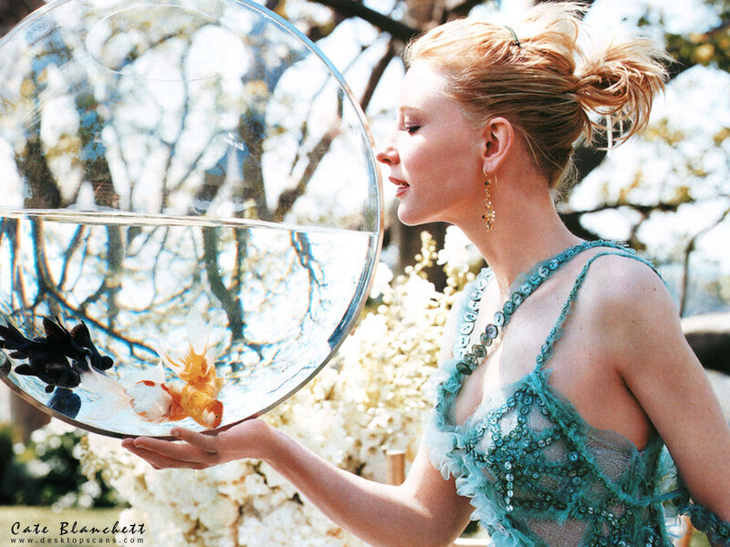 Woman Holding Fishbowl