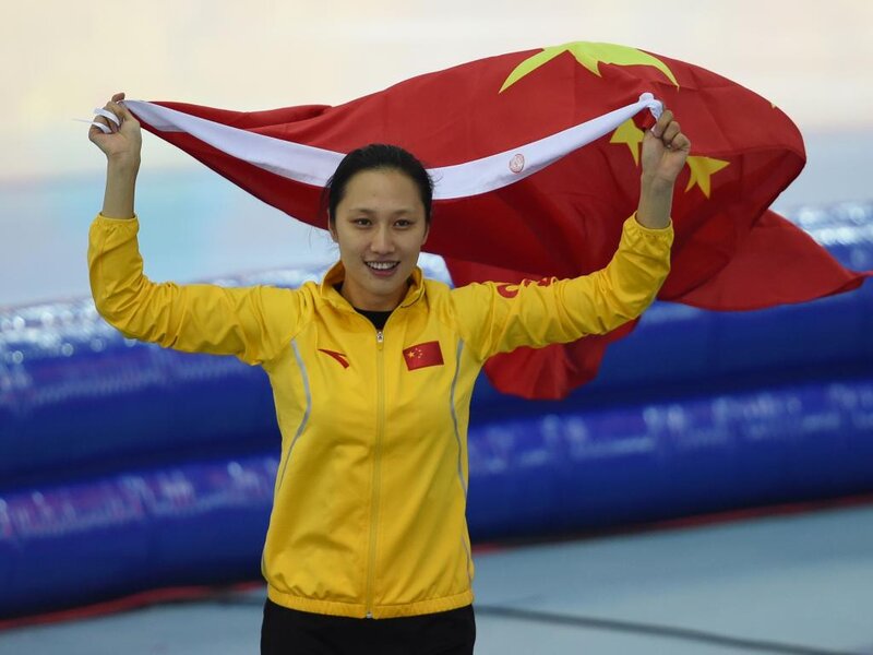 Woman Holding Flag — Yellow