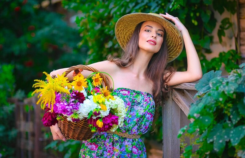Woman Holding Flower Basket — Green, Serene, Afternoon, Photograph
