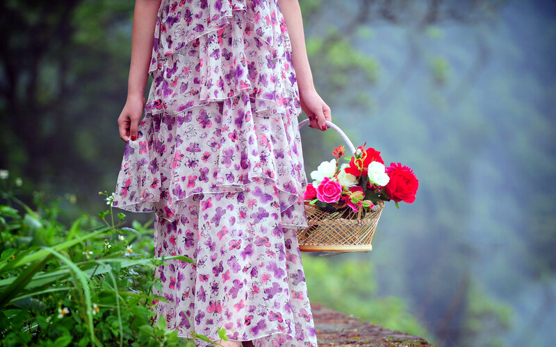 Woman Holding Flower Basket — Purple