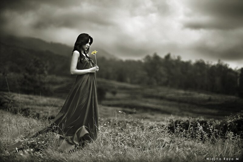 Woman Holding Flower — Black, Dramatic, Photograph, Field