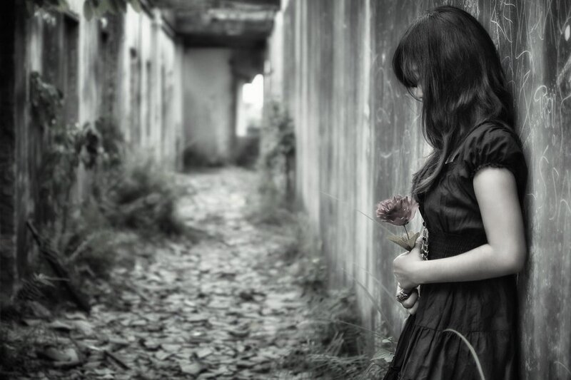 Woman Holding Flower — Black, Melancholic