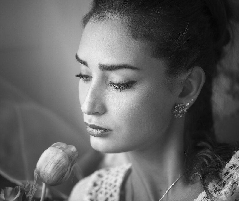 Woman Holding Flower — Black, Serene, Photograph, Earring