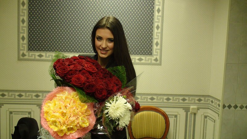 Woman Holding Flower Bouquets