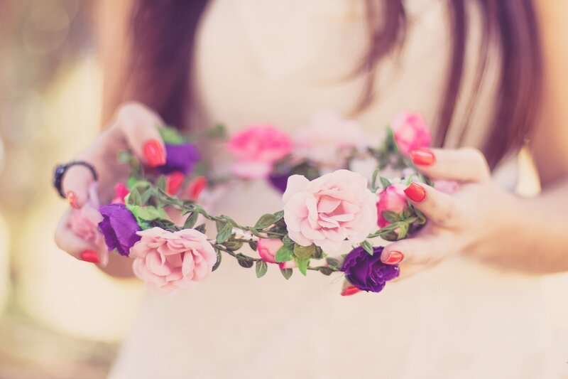 Woman Holding Flower Crown