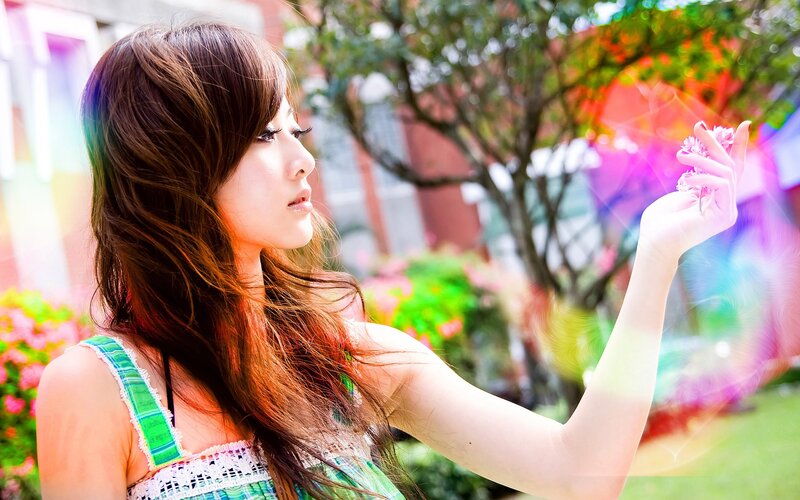 Woman Holding Flower — Green, Serene, Afternoon, Photograph, Tree, Grass