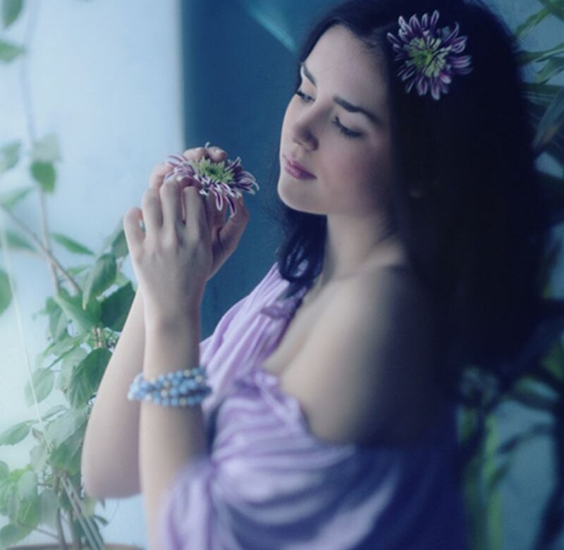 Woman Holding Flower — Purple