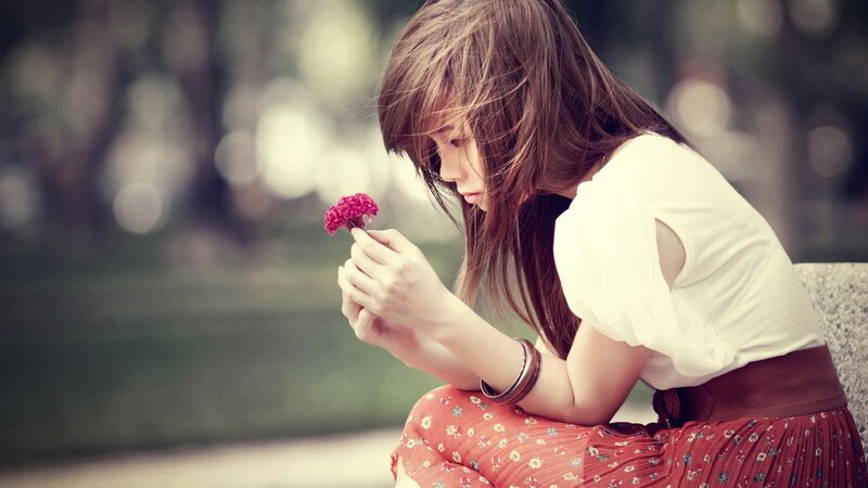 Woman Holding Flower — White, Melancholic