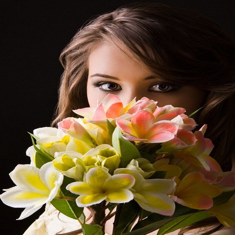 woman holding flowers