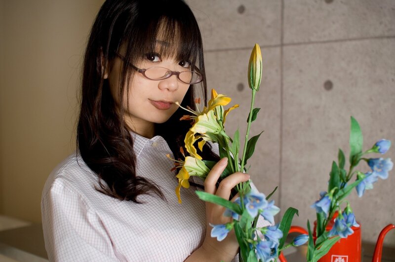 woman holding flowers
